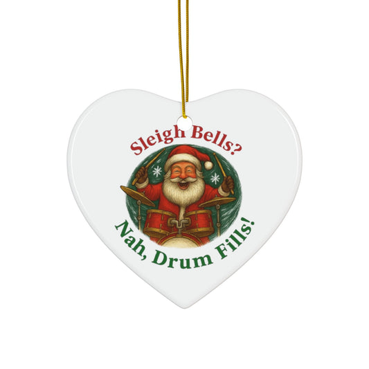 Heart-shaped Christmas ornament with Santa Claus and humorous text on a white background